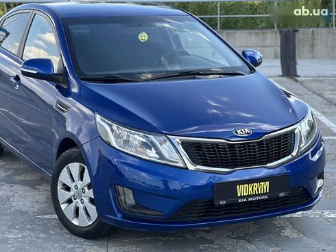 Kia Rio 2013 - фото 7