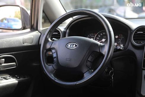 Kia Carens 2009 - фото 14