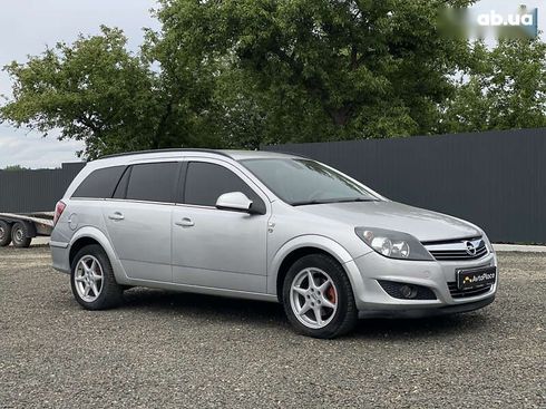 Opel Astra 2010 - фото 28