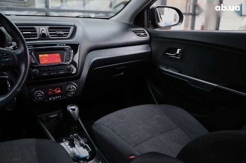 Kia Rio 2012 - фото 11