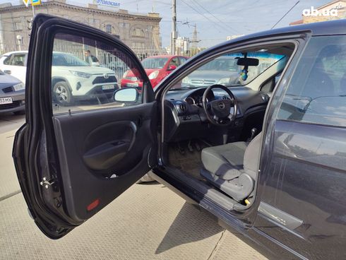 Chevrolet Aveo 2008 черный - фото 11