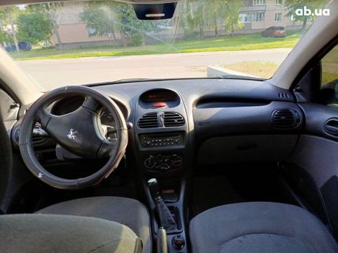 Peugeot 206 2007 серебристый - фото 3