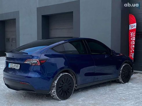 Tesla Model Y 2024 - фото 10