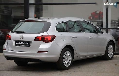 Opel Astra 2010 - фото 4