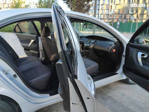 Nissan Primera 2007 - фото 27