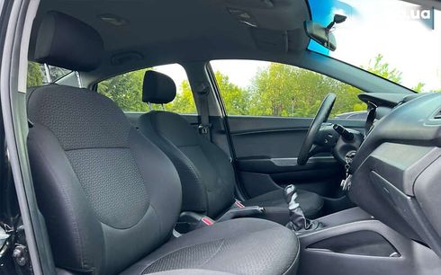 Kia Rio 2013 - фото 9