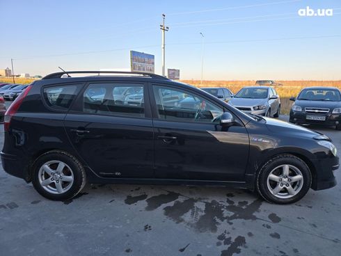 Hyundai i30 2010 черный - фото 7