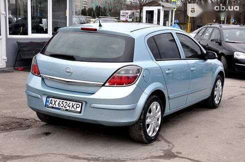 Opel Astra 2009 - фото 22
