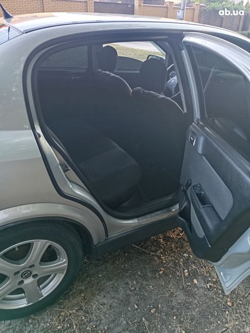 Opel Astra G 2008 серебристый - фото 5