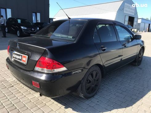 Mitsubishi Lancer 2008 черный - фото 11