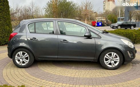 Opel Corsa 2011 - фото 8