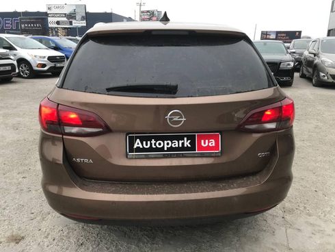 Opel Astra 2016 коричневый - фото 7