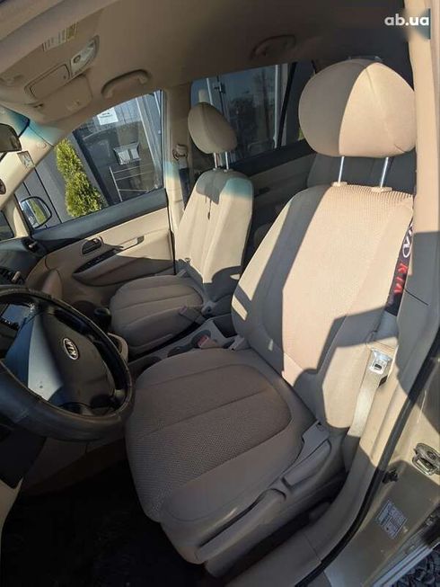 Kia Carens 2007 - фото 15