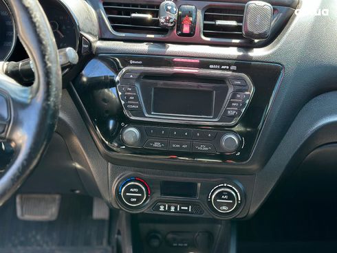Kia Rio 2013 белый - фото 23