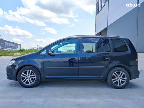 Volkswagen Touran 2010 черный - фото 8