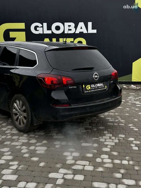 Opel Astra 2011 - фото 18