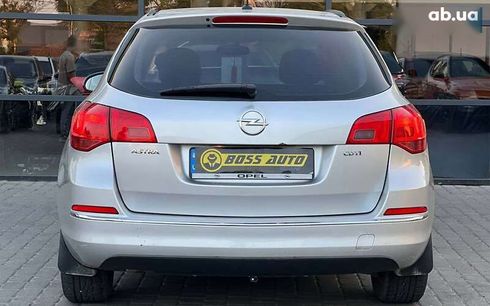 Opel Astra 2014 - фото 6