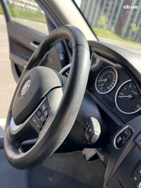 BMW 1 серия 2012 черный - фото 7