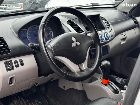 Mitsubishi l 200 2009 черный - фото 12