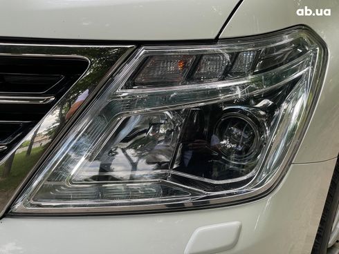 Nissan Patrol 2013 белый - фото 19