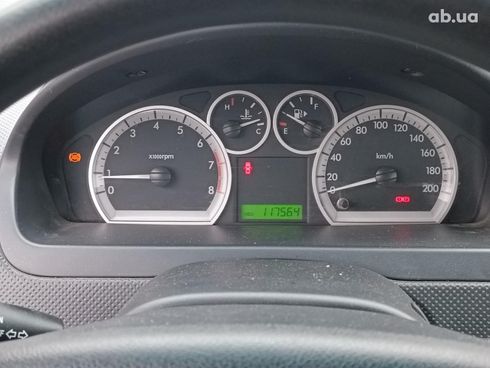 Chevrolet Aveo 2008 оранжевый - фото 36