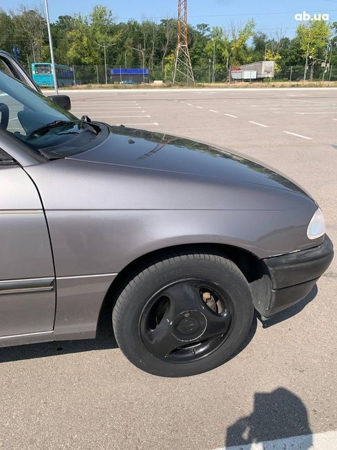 Opel Astra 1992 серый - фото 10