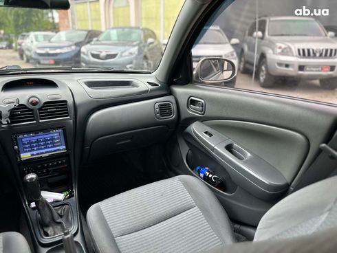 Nissan Almera 2007 бежевый - фото 16