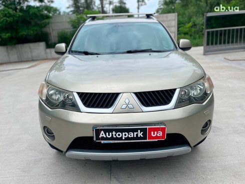 Mitsubishi Outlander XL 2009 бежевый - фото 2