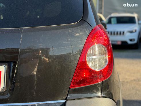 Opel Antara 2007 черный - фото 11