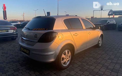 Opel Astra 2010 - фото 7