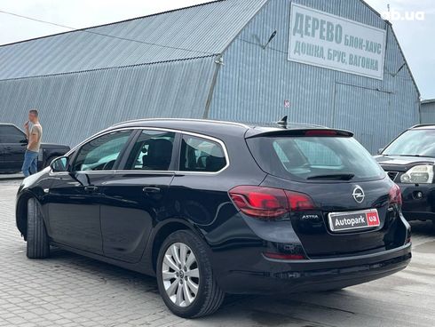 Opel Astra 2011 черный - фото 37