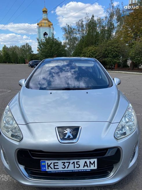 Peugeot 308 2011 серебристый - фото 5