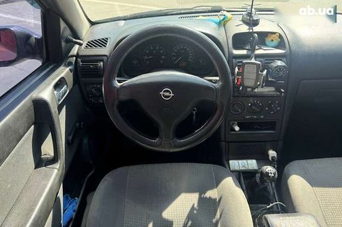 Opel Astra 2007 - фото 14