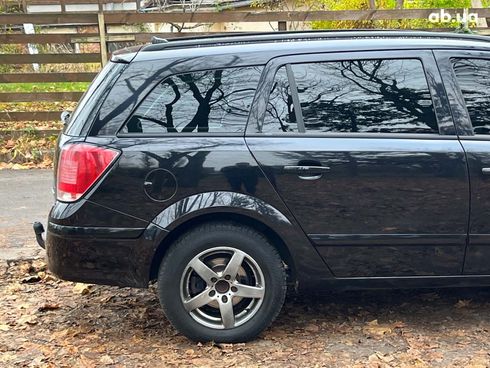 Opel Astra 2006 черный - фото 13