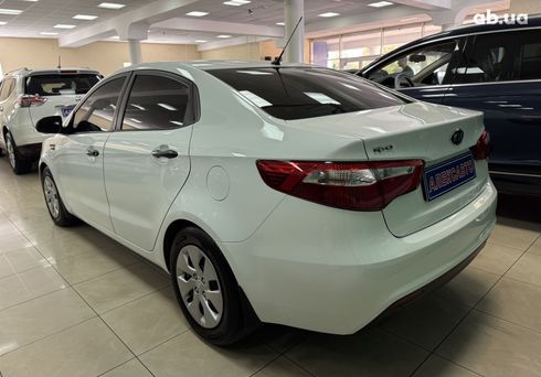 Kia Rio 2012 белый - фото 13