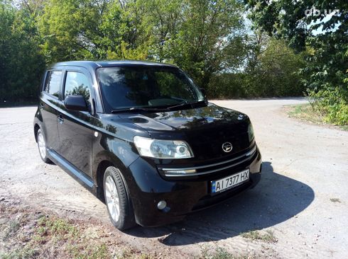 Daihatsu Materia 2007 черный - фото 7