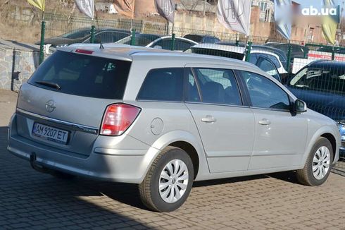 Opel Astra 2010 - фото 15