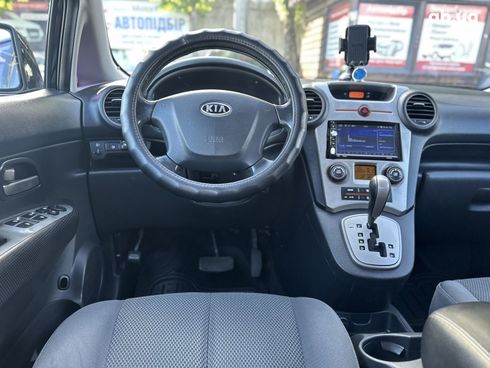 Kia Carens 2008 черный - фото 11