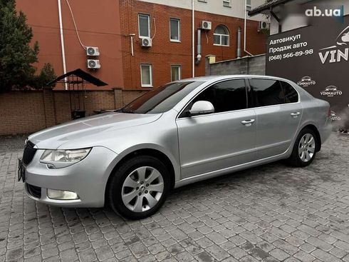 Skoda Superb 2012 - фото 6