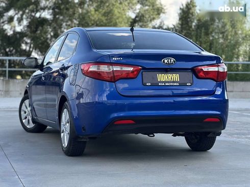 Kia Rio 2013 - фото 18