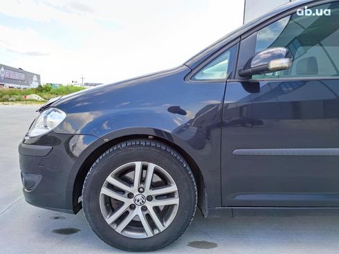 Volkswagen Touran 2010 черный - фото 9