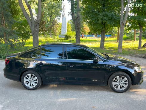 Volkswagen Jetta 2016 черный - фото 4