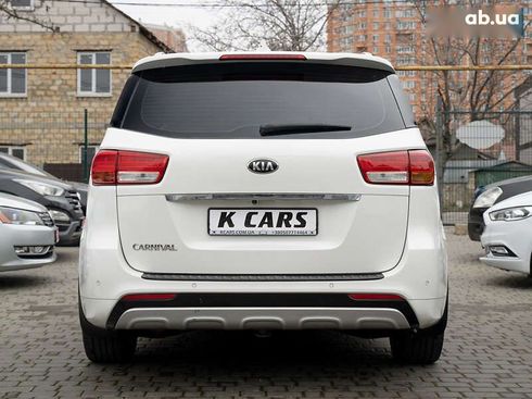 Kia Carnival 2014 - фото 13