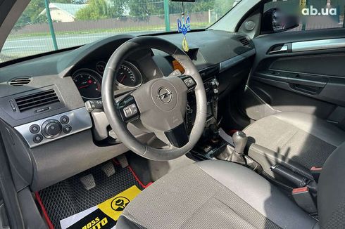 Opel Astra 2010 - фото 11