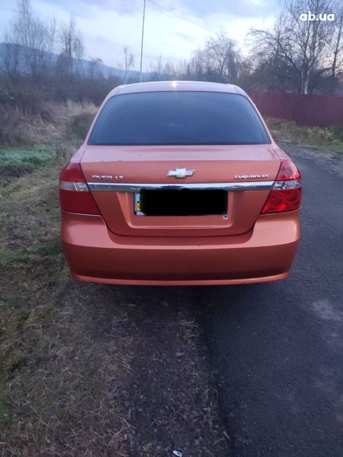 Chevrolet Aveo 2008 оранжевый - фото 7