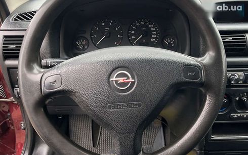 Opel Astra 2000 - фото 12