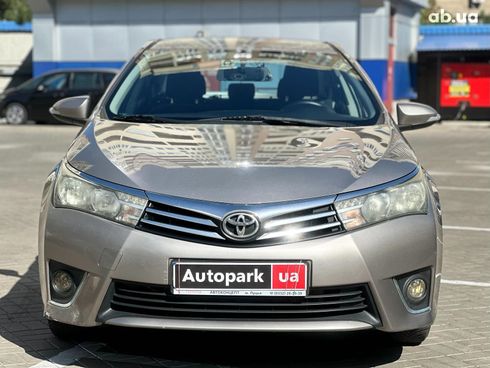 Toyota Corolla 2013 коричневый - фото 2