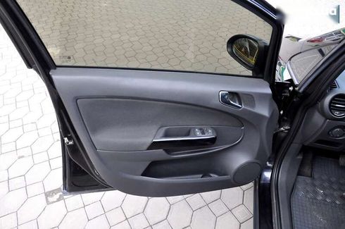 Opel Corsa 2008 - фото 14