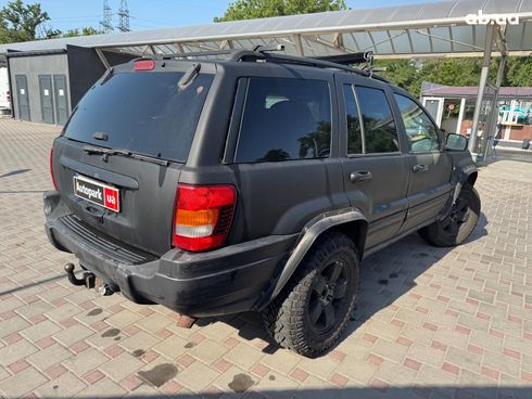 Jeep Grand Cherokee 2002 черный - фото 4