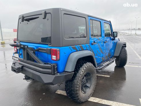 Jeep Wrangler 2014 синий - фото 7